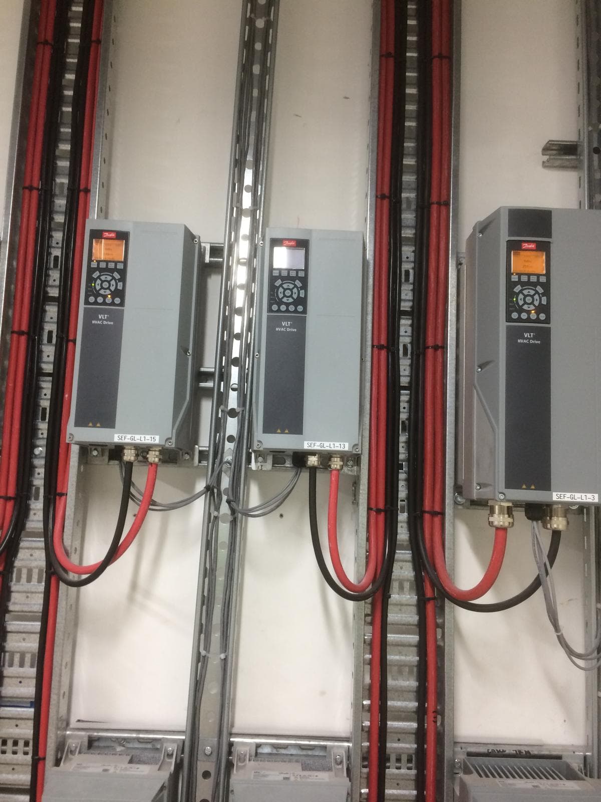 Danfoss HVAC variable speed drives installed with red and black power cabling